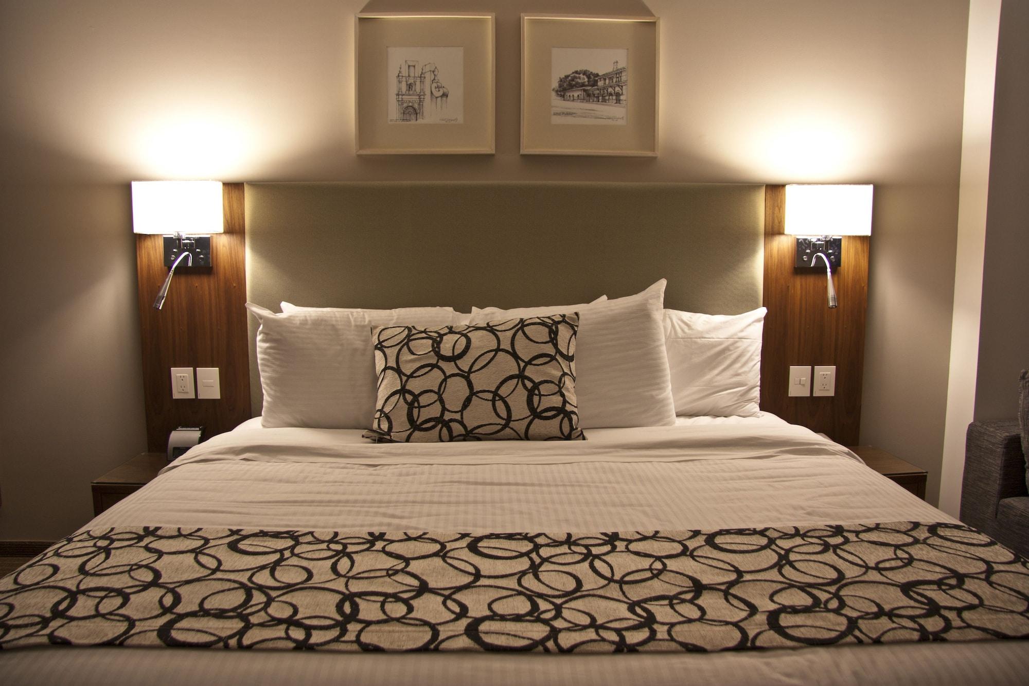 Casa Inn Premium Hotel Queretaro Exterior photo A bed